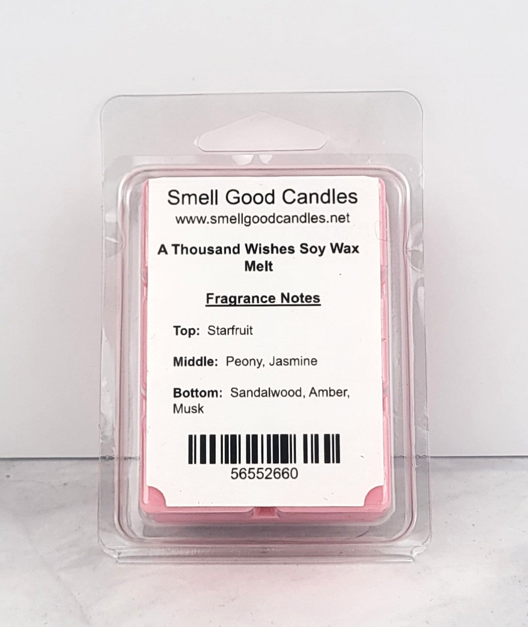 Luxurious soy wax melt with soft, feminine scent profile in cozy home setting