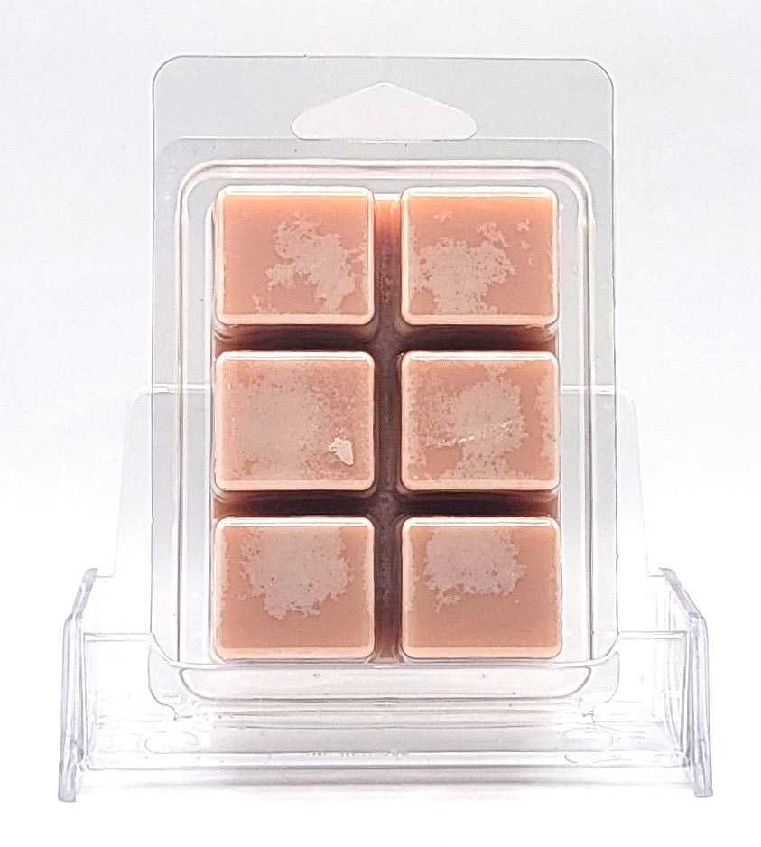 Western-inspired soy wax melt featuring cedarwood, musk, and amber wood