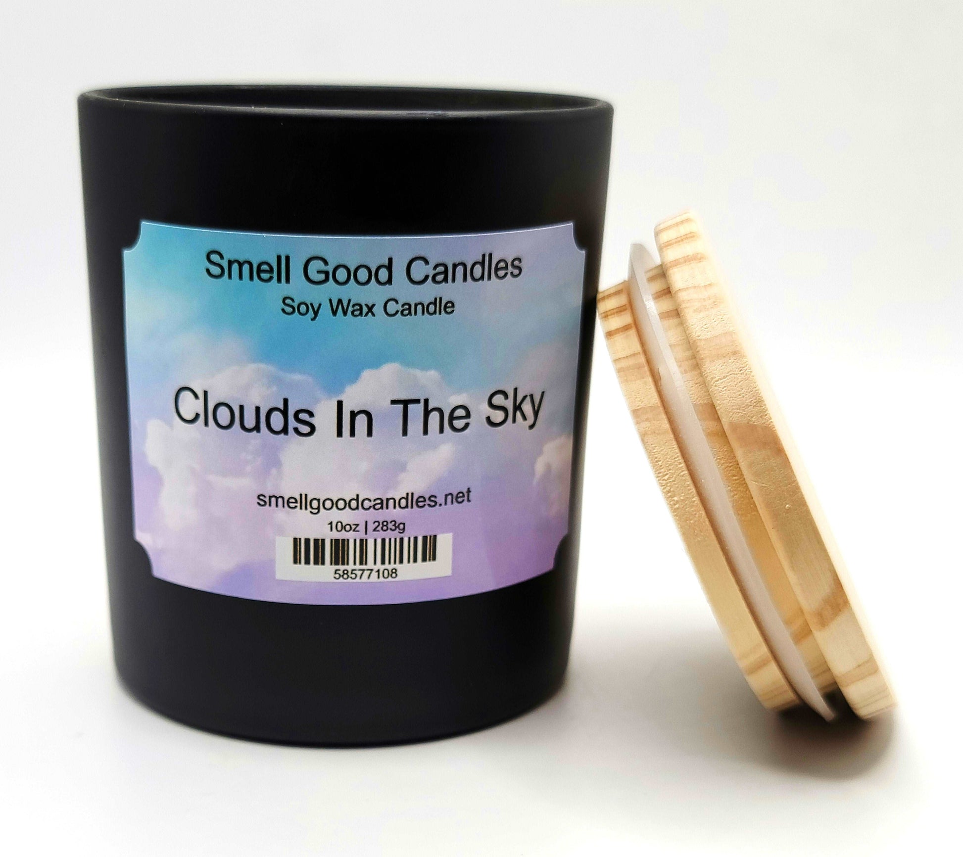 Hand-poured soy wax candle with soft, dreamy fragrance notes