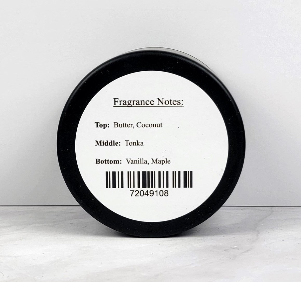 Hand-poured soy wax candle in a travel-friendly tin with a cozy café aroma