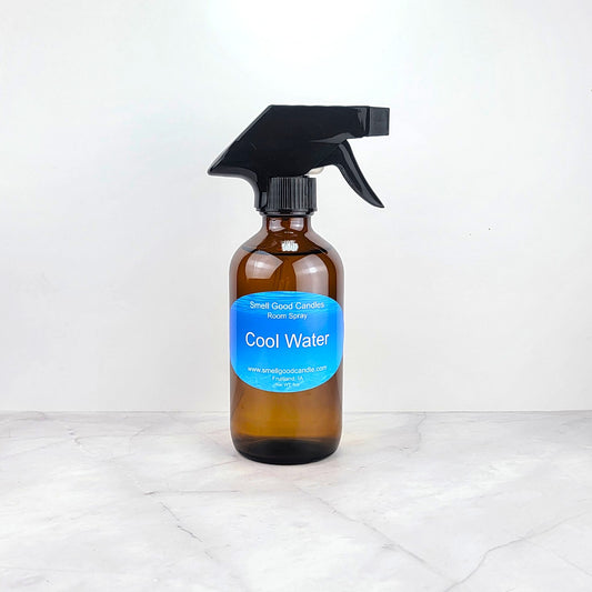 Serene ocean waves, evoking the freshness of the Cool Water scent