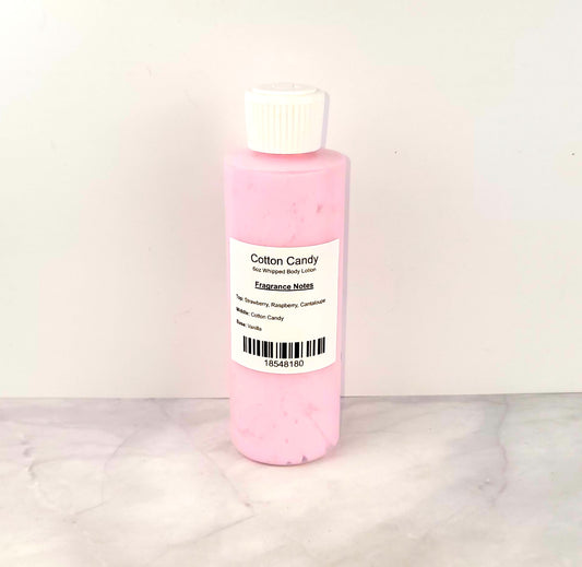 Handmade Cotton Candy Whipped Body Lotion with a lightweight, airy texture that deeply hydrates and leaves a long-lasting, fruity-sweet scent.