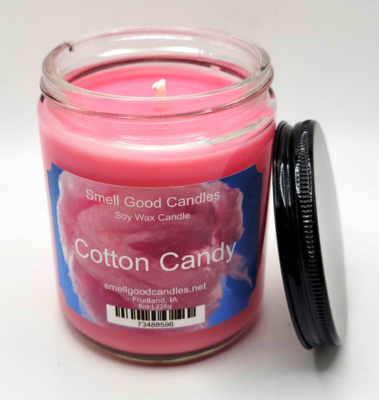 Hand-poured soy wax candle with strawberry, raspberry, and caramel fragrance
