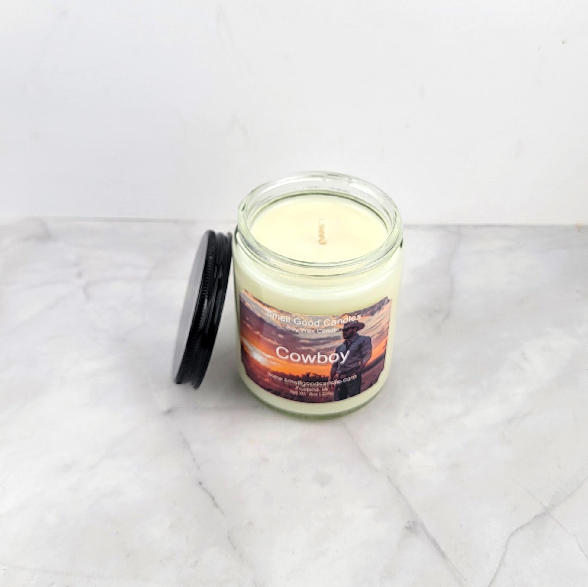 Cowboy 8oz Premium Soy Wax Candle with bold, masculine fragrance notes.