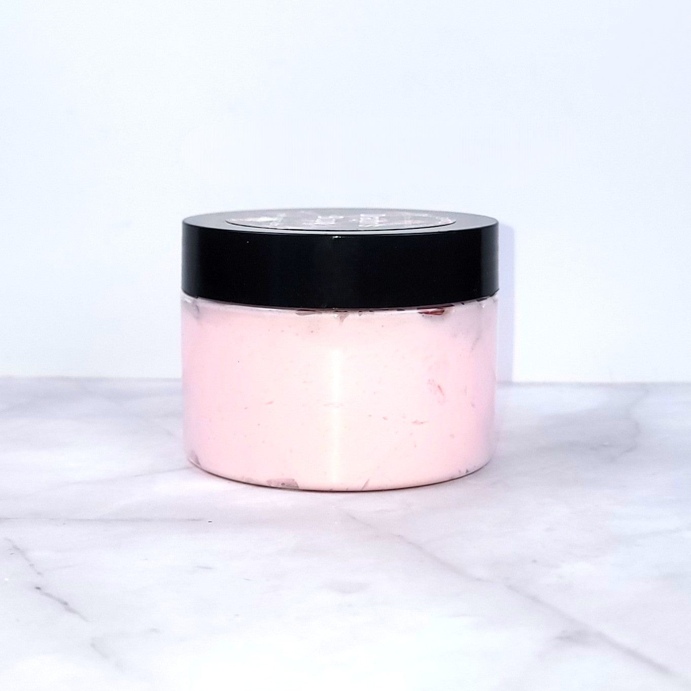 Handmade Dragon’s Blood Whipped Body Lotion with cedarwood, patchouli, and orange essential oils for a deeply hydrating formula and a bold, warm scent.