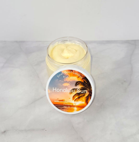 Honolulu Sun Whipped Body Lotion with a tropical blend of coconut, citrus, and tonka