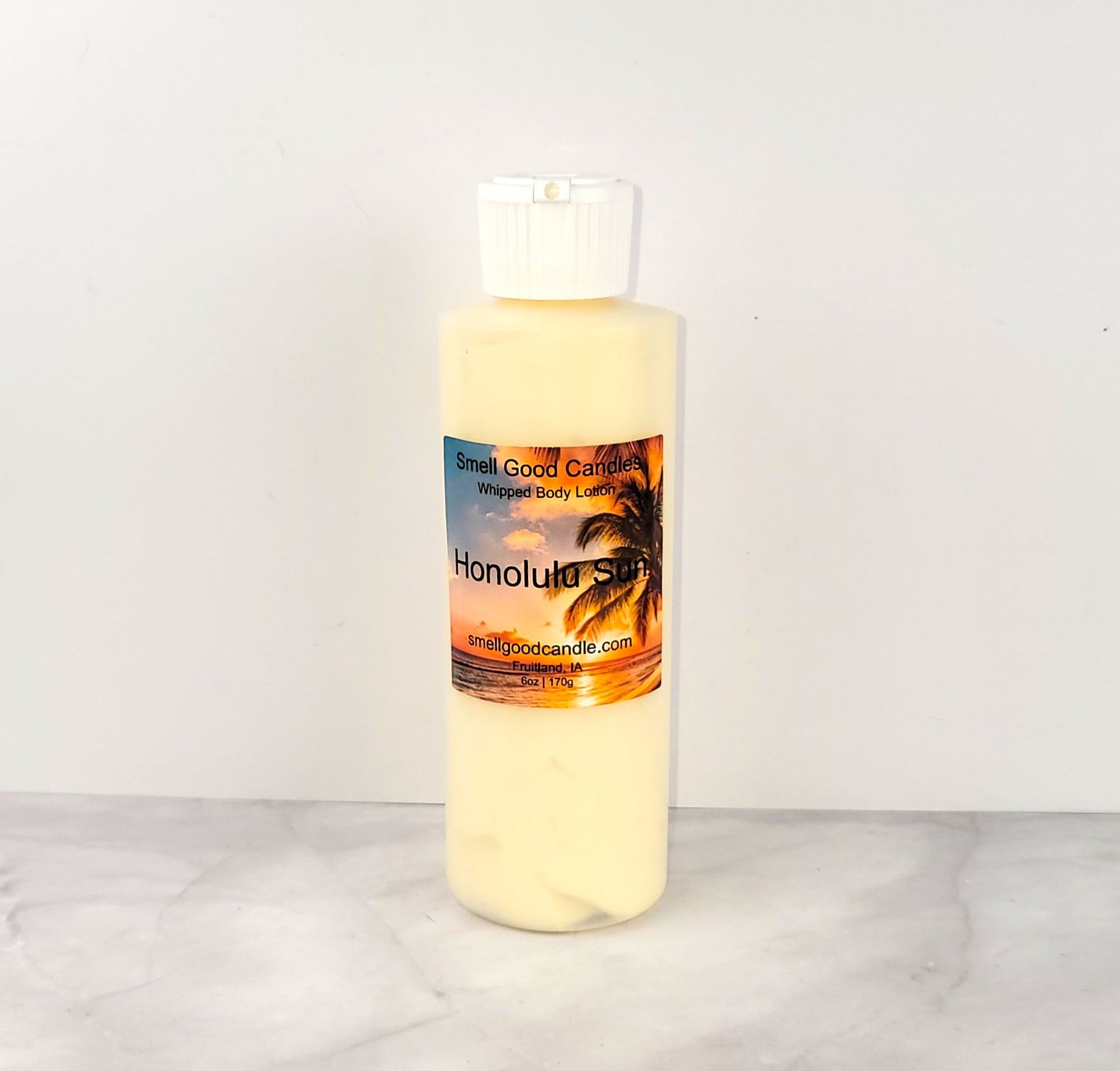 6oz Honolulu Sun Whipped Body Lotion, inspired by Bath & Body Works, with a tropical blend of orange, coconut, and tonka for deep hydration and silky-smooth skin.