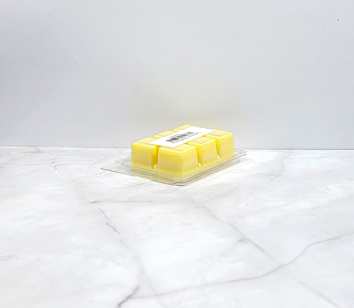 Handcrafted soy wax melt with lemon, lemongrass, and musk