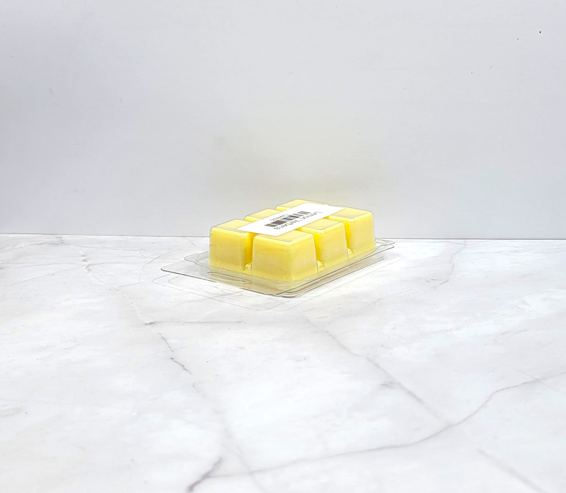 Handcrafted soy wax melt with lemon, lemongrass, and musk