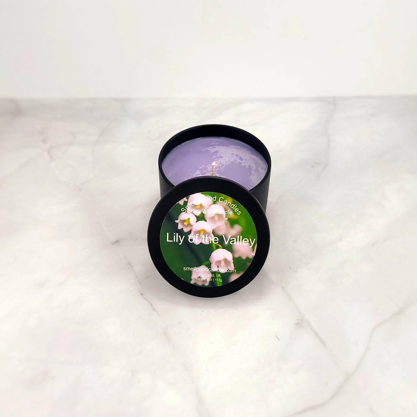 Hand-poured candle with fresh lily, lilac, and musk fragrance.