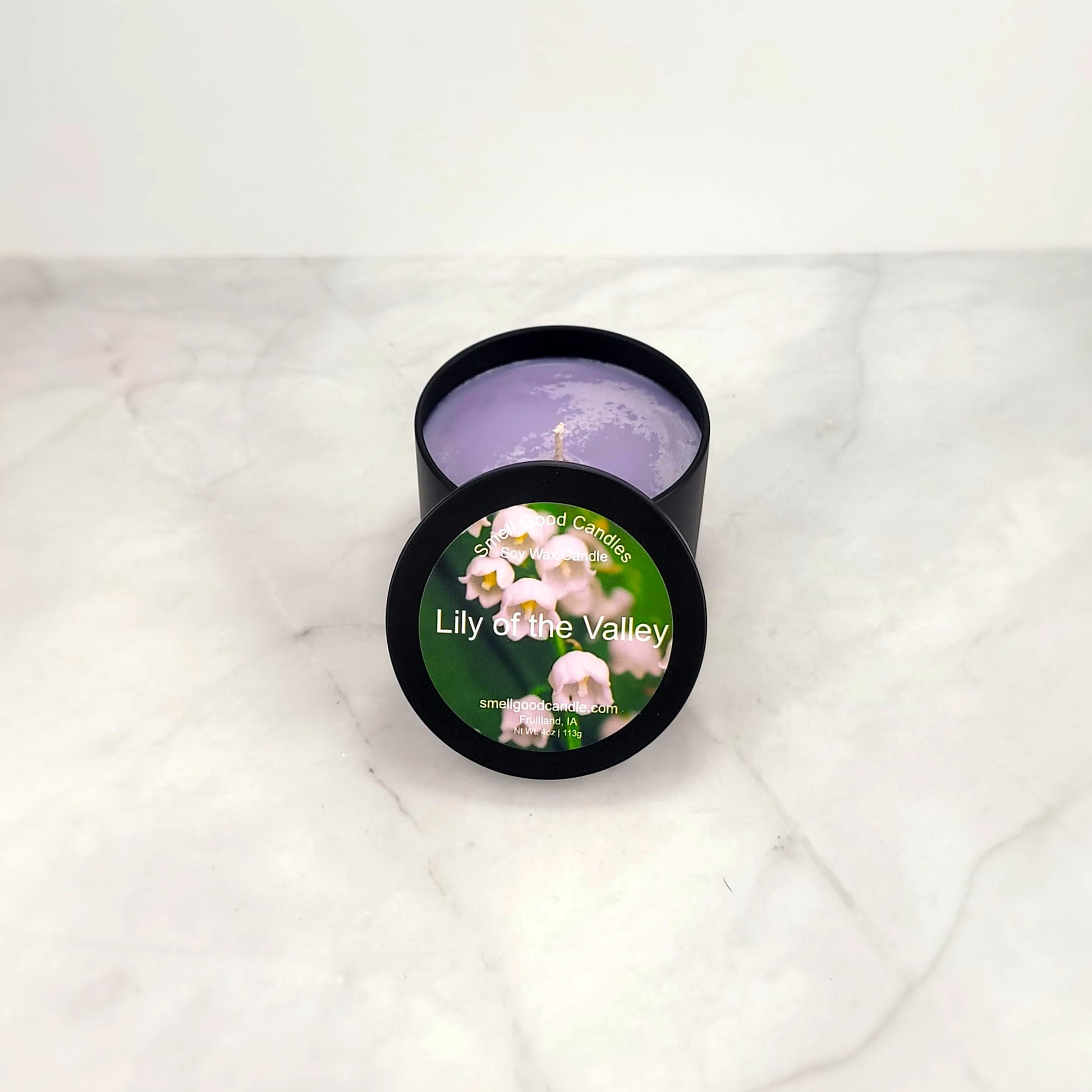 Hand-poured candle with fresh lily, lilac, and musk fragrance.
