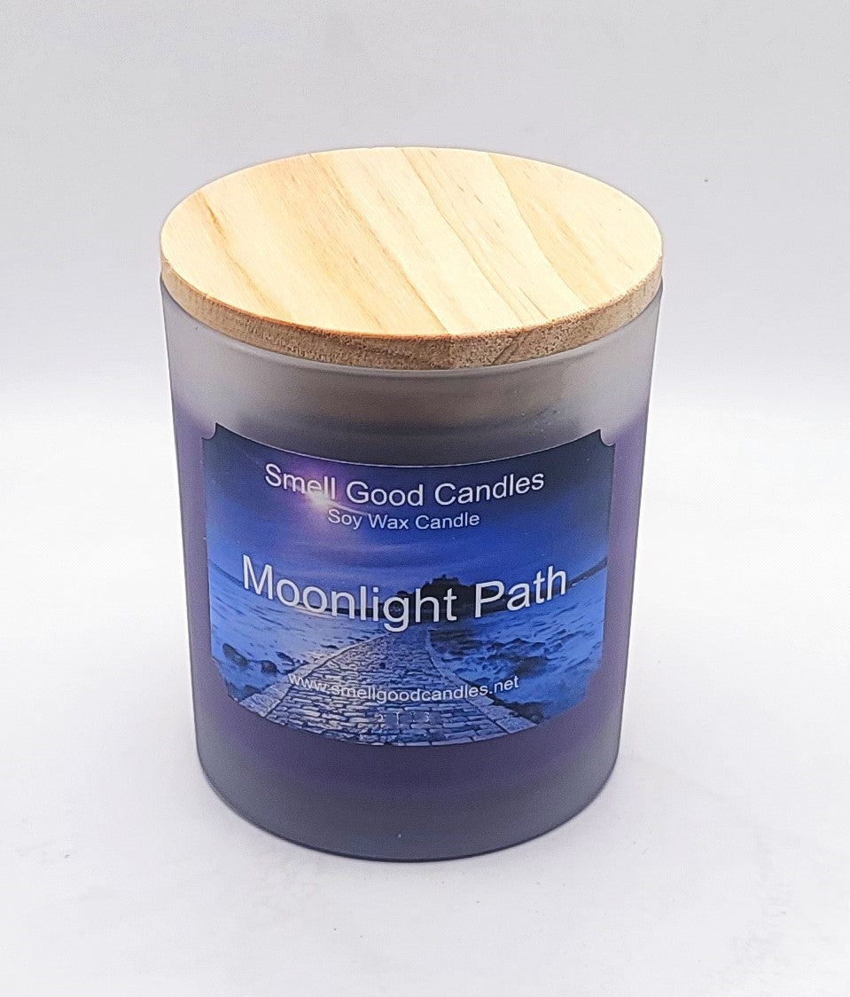 Luxurious soy wax candle with bergamot, jasmine, and softwoods fragrance.