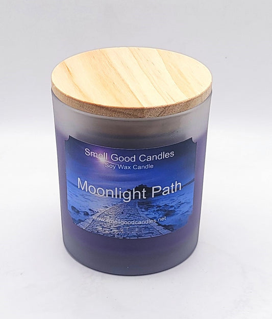 Luxurious soy wax candle with bergamot, jasmine, and softwoods fragrance.