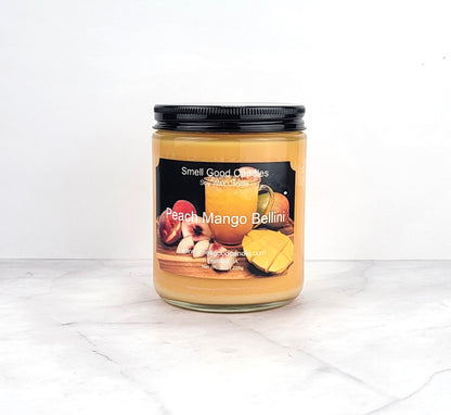 Peach Mango Bellini 8oz soy wax candle with citrus and tropical fruit notes.