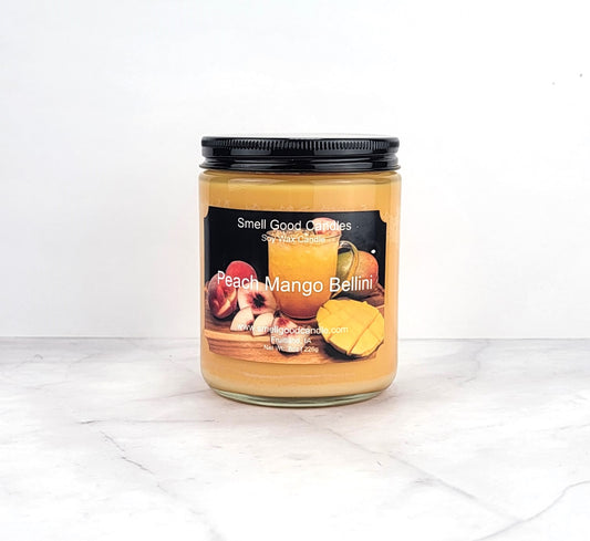Peach Mango Bellini 8oz soy wax candle with citrus and tropical fruit notes.