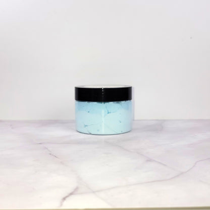 Coastal-inspired Sea Minerals Whipped Lotion with a fresh ozone top, eucalyptus heart, and freesia base for nourishing hydration and a delicate scent.