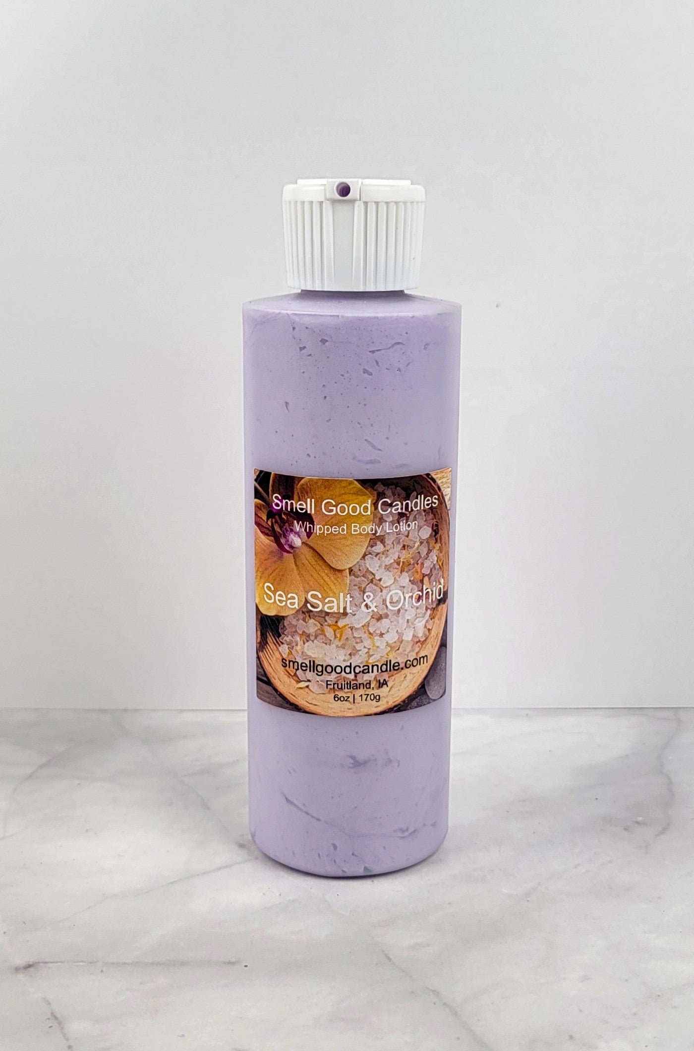 Sea Salt and Orchid Whipped Body Lotion in a 6oz jar with coastal-inspired packaging