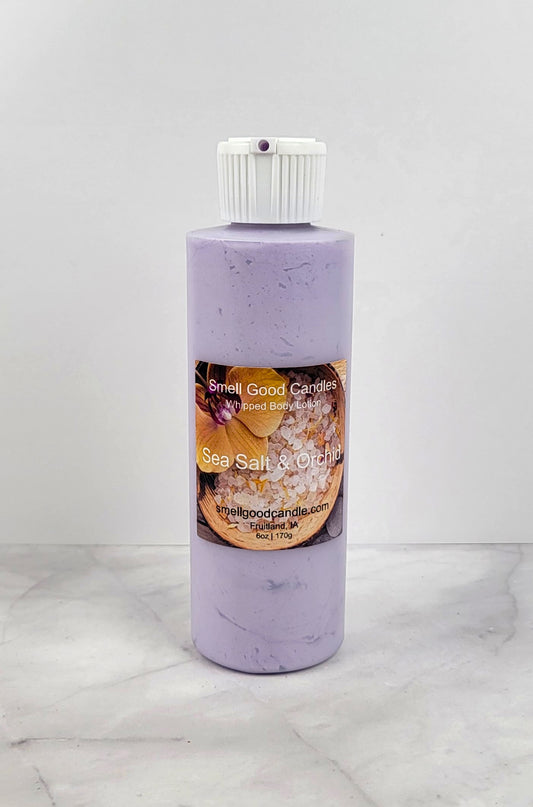 Sea Salt and Orchid Whipped Body Lotion in a 6oz jar with coastal-inspired packaging