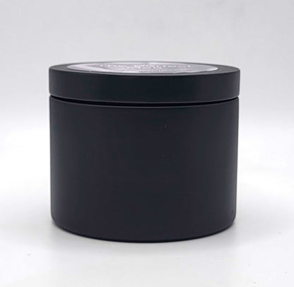 Hand-poured 100% soy wax candle with citrus, spice, and rich woody notes.