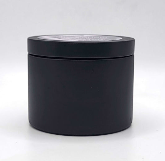 Hand-poured 100% soy wax candle with citrus, spice, and rich woody notes.